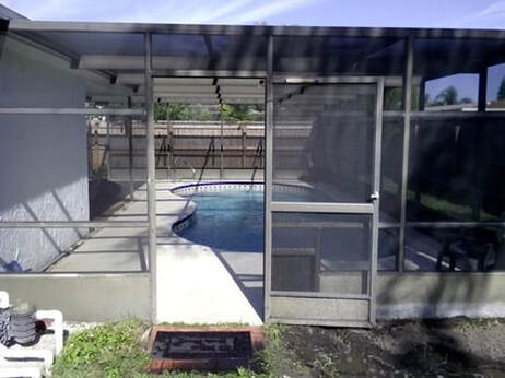 lanai screens and pool deck after pressure washing