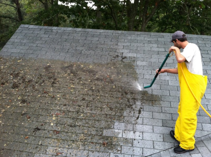 cleaning roof debris that could threaten cleaned gutters